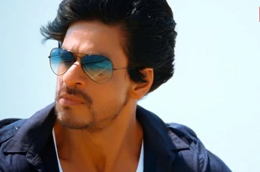 Ashima Chhibber laughing with Shah Rukh Khan at Don success party